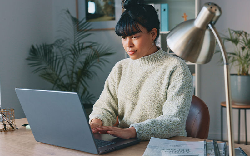 Professional using laptop