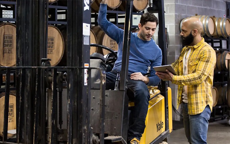 Teammates working together using a tablet