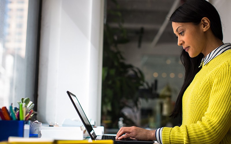 Professional using laptop