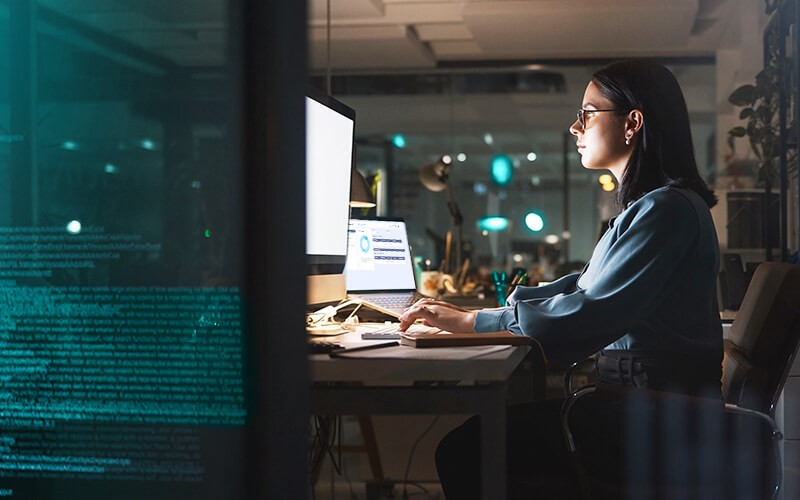 Woman working late at night