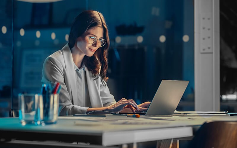 Woman working late at night