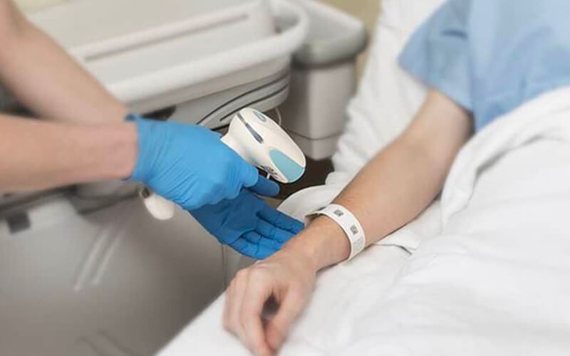 Healthcare worker using the Honeywell scanner