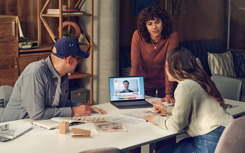 HP AI solutions Teammates working together at the office