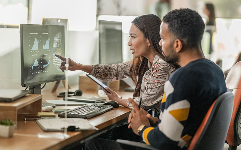 Stop advanced threats and protect critical assets View of skyscrapers from the ground