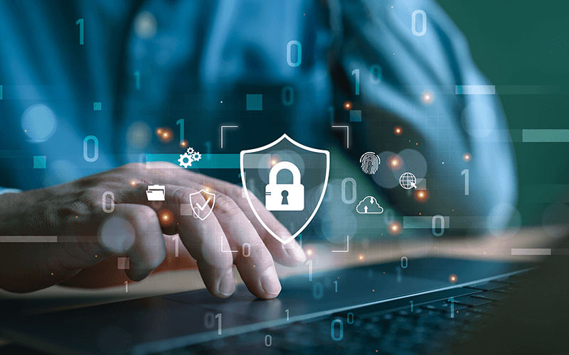 Person typing on laptop