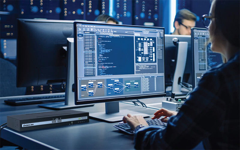 Public sector Woman coding at the data center