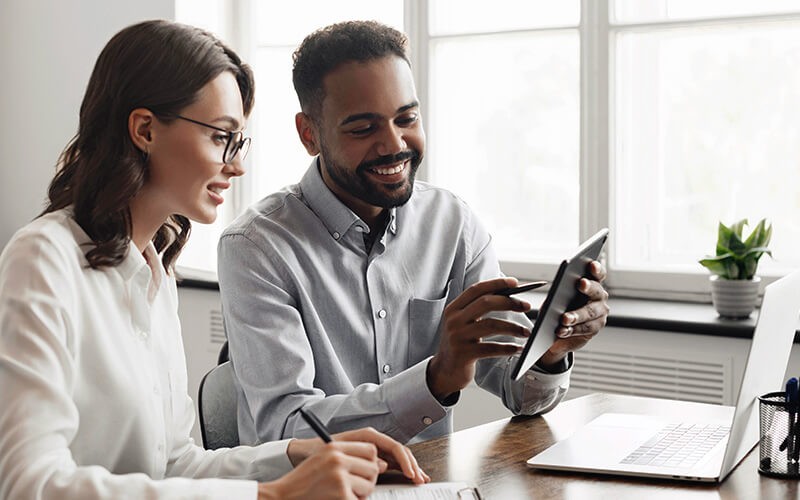 LastPass business solutions Two person collaborating with each other