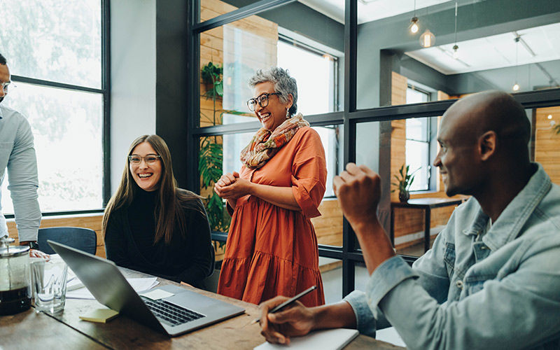 Users in meeting room collaborating