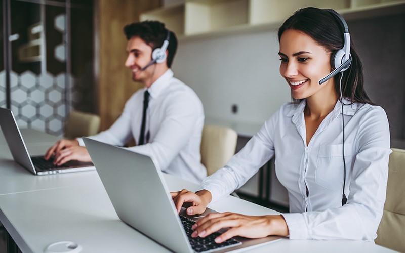 Professionals working on their laptop