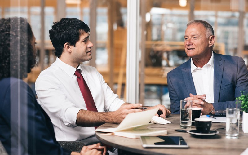 Two employees collaborating 