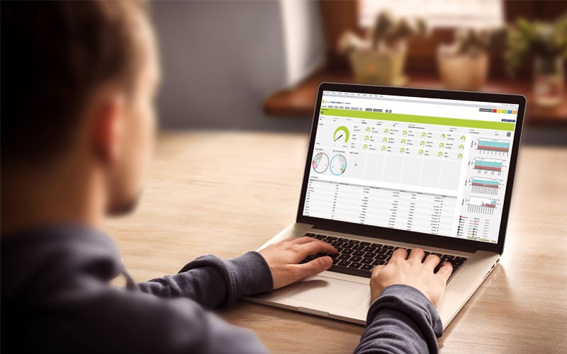 PRTG monitors all systems of your IT infrastructure User on laptop device that displays Paessler software on screen