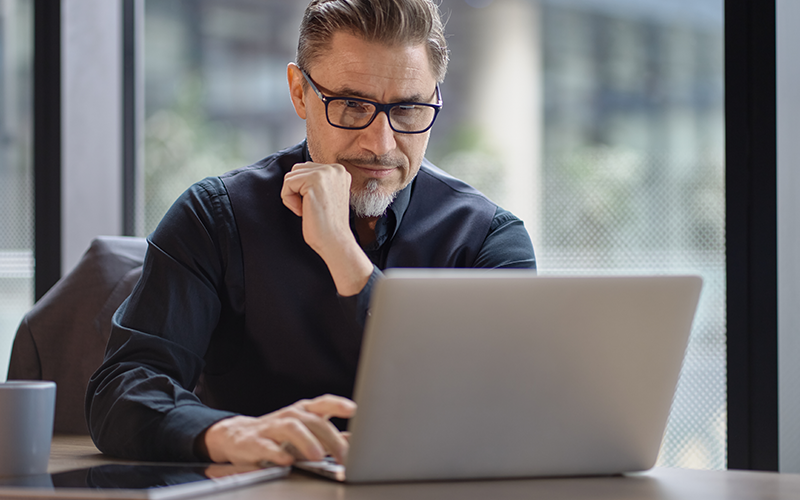 Professional working on laptop