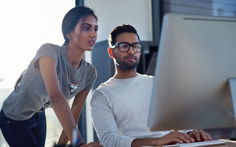 Quest Microsoft platform management solutions Two users looking at desktop