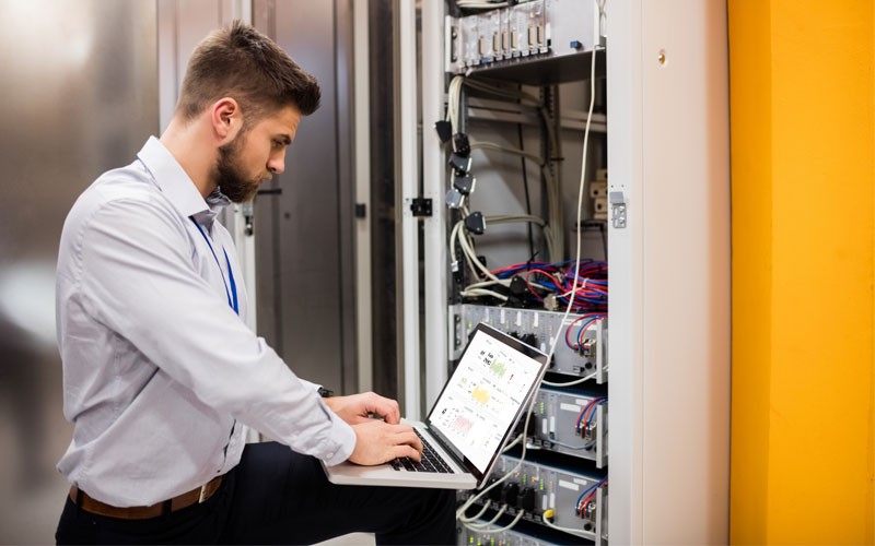 Man working in server room