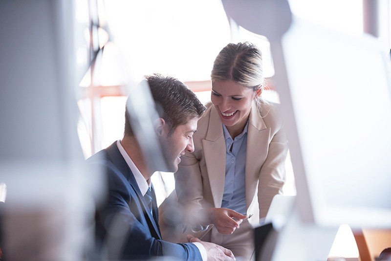 Business professionals use RackWare Management Module and have a discussion