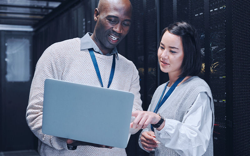 Teammates collaborating together at the office