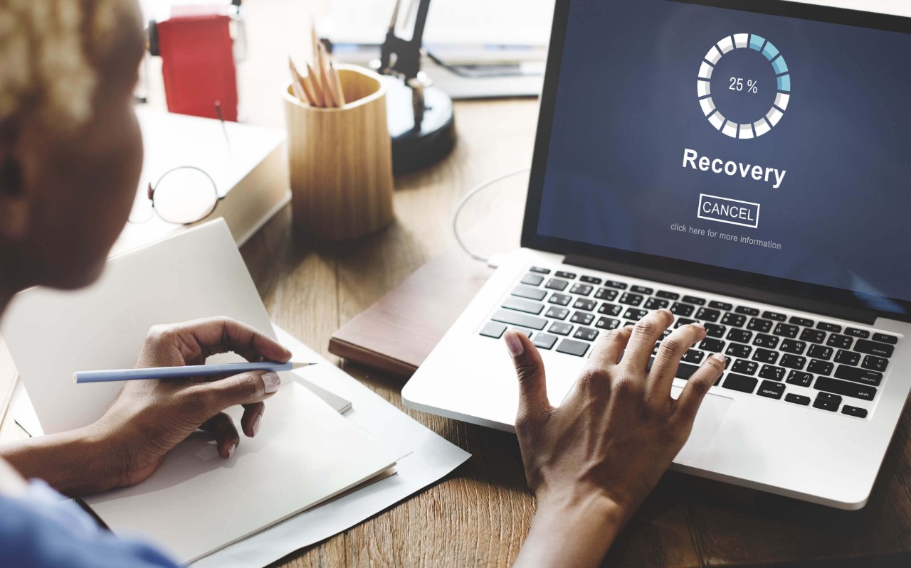 Data protection Person typing on laptop