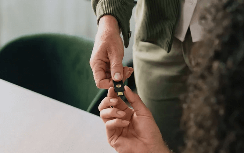Person passing the YubiKey