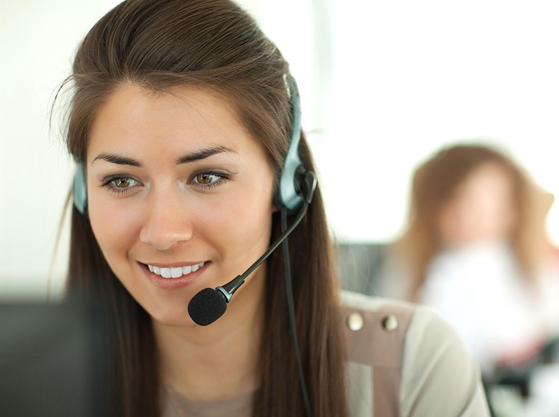 Automatically transfer customers to a human agent to provide the best customer experience Customer solutions representative talking with client