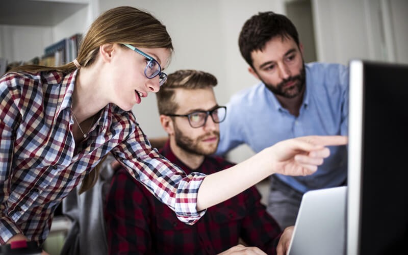 Business professionals working on project management strategy