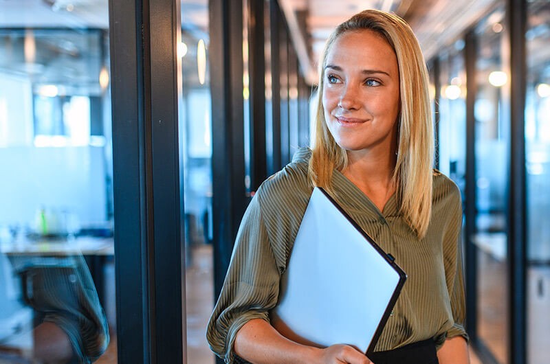 Business professional walking through modern office